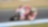 Superbike y piloto de Ducati corriendo por una curva de la pista