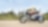 Hombre conduciendo una moto por una ruta nacional